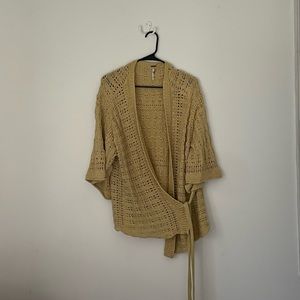 Free People sweater. Side tie, knit